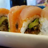 Blue Hawail Roll · Deep fried soft shell crab, avocado roll, topped with salmon, tuna with special sauce