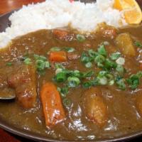 Katsu Curry or Chicken Katsu Curry · Breaded and deep fried pork or chicken cutlet with curry.
