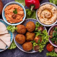 Veggie combo plate  · Hummus, Baba Ganoush, Dolma, Falafel, Tabbouleh.