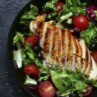 Chicken Salad · Grilled chicken, seasoned mixed greens, cucumbers, tomatoes, olives, lemon juice, and olive ...