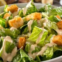 Caesar Salad · Romaine lettuce, pepperoncini, croutons, cheese, and your choice of dressing
