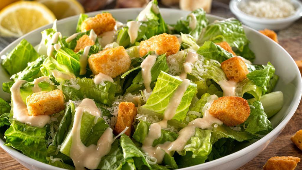 Caesar Salad · Romaine lettuce, pepperoncini, croutons, cheese, and your choice of dressing