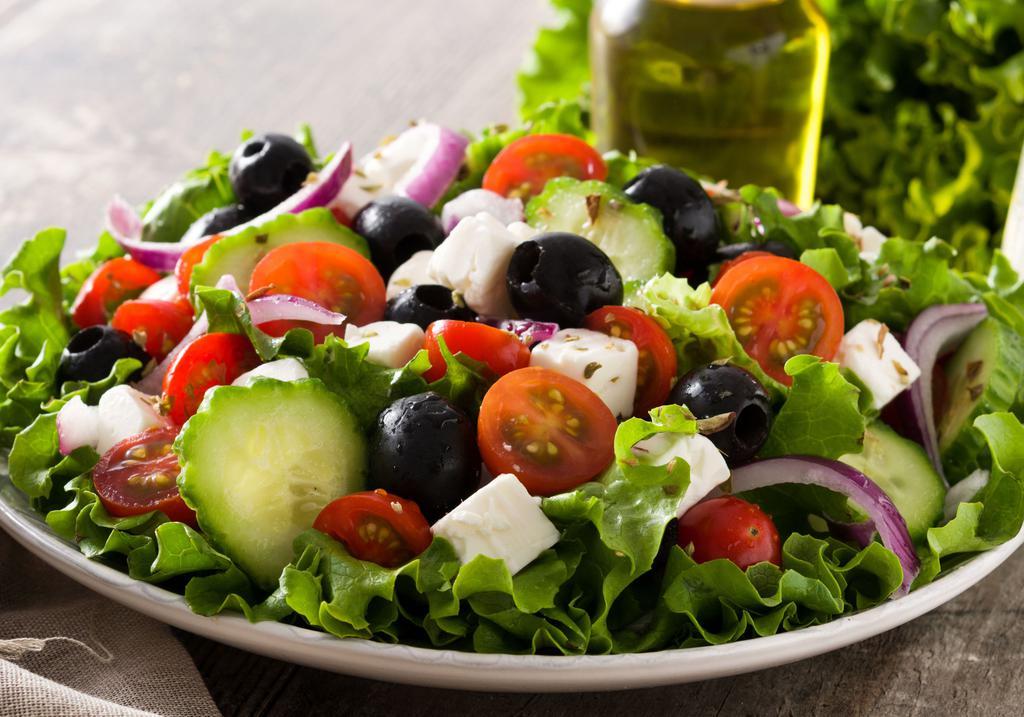 Greek Salad · Lettuce, tomatoes, onions, black olives, pepperoncini, Feta cheese, and your choice of dressing.