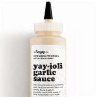 Yay-ioli Garlic Sauce - 9oz Bottle · Our house made creamy, dreamy, and garlicky aioli.