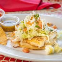 Tacos Nikko · Your choice of grilled fish or sautéed shrimp on a double corn tortilla with cheese, cilantr...