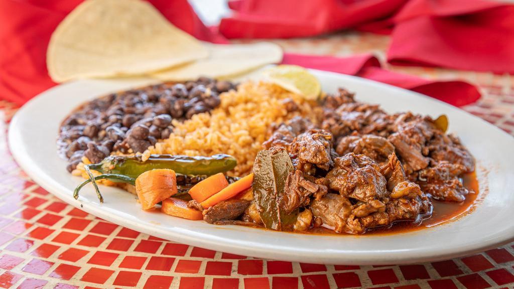 Barbacoa Platter · Served with rice and black beans.