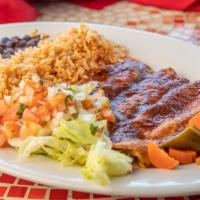 Enchilada Platter (Small) · 2 enchiladas chicken, steak or cheese on corn tortillas served with rice and beans.