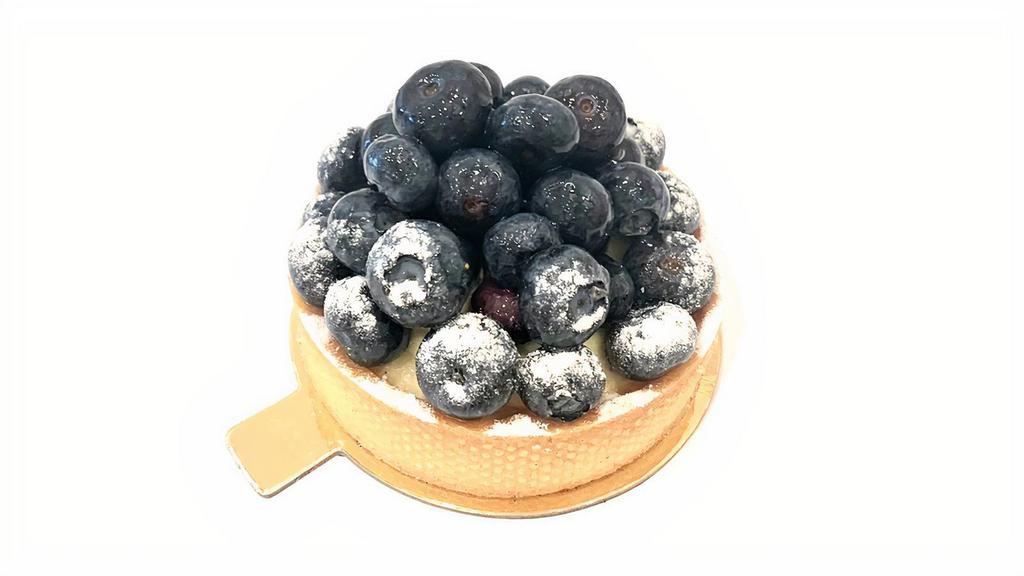 Blueberries & Vanilla Tart · Organic blueberries, Madagascar Vanilla pastry cream in a shell 