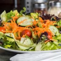 Mixed Greens Salad · Romaine, spring mix, carrots, cucumbers, tomatoes.