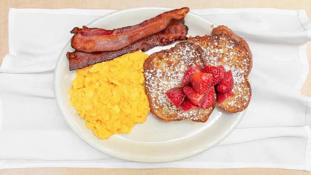French Toast · Two cinnamon challah french toast, two eggs with bacon