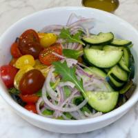 Mixed Green Salad · cucumbers, cherry tomatoes, onions, lemon herb vinaigrette