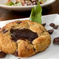 Brownie Stuffed Chocolate Chip Cookie · made famous at our pizzeria, now available here!