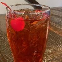 Shirley Temple · Sprite, Grenadine Syrup, Garnished with a Cherry