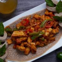 Chicken Tibs · Chicken breast marinated with Ethiopian spice.