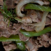 Beef Tibs · Lean beef marinated with Ethiopian spice.