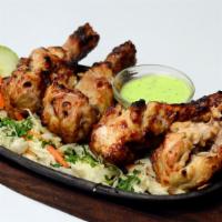 Chicken Malai Kebab · Hearty chicken prepared with garlic, ginger, and cardmom then roasted in a traditional tando...
