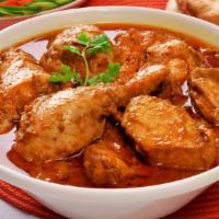 Chicken Korma · Tender chicken, yogurt, onions, and cashews braised in a cream sauce.