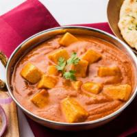 Paneer Tikka Masala · Traditional Indian paneer cheese served in a creamy tomato-based curry.