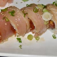 ** Jose's Special Roll · Spicy tuna, cucumber, and nuts with white tuna on top and green onion.