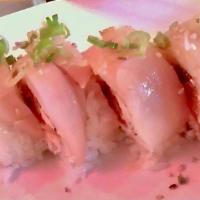 **Esther Roll · Imitation crab, cream cheese, spicy tuna, cucumber, wrapped with white tuna and green onion.