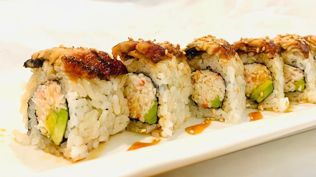 **California Deluxe Roll(6pcs) · Imitation crab, avocado, and eel onto w.sweet sauce, sesame seed.