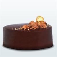 Chocolate Ferro Roche Cake · The Ferro Roche Cake is a beautiful and delicious eggless cake that is made up of pure choco...