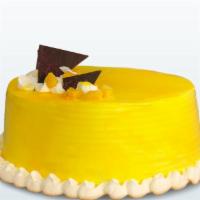 Mango Cake · The Eggless Mango Cake comes as a surprise for all mango lovers as this cake is just what wi...