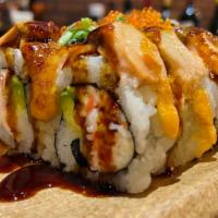 Lion King Roll · Imitation Crab Meat and Avocado Topped with Baked Salmon, and Spicy Aioli, Soy glaze.