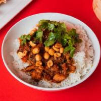 Spicy Kung Pao Chicken Bowl · Tender chicken that is cooked in a sweet and spicy sichuan chili-soy sauce, served on jasmin...