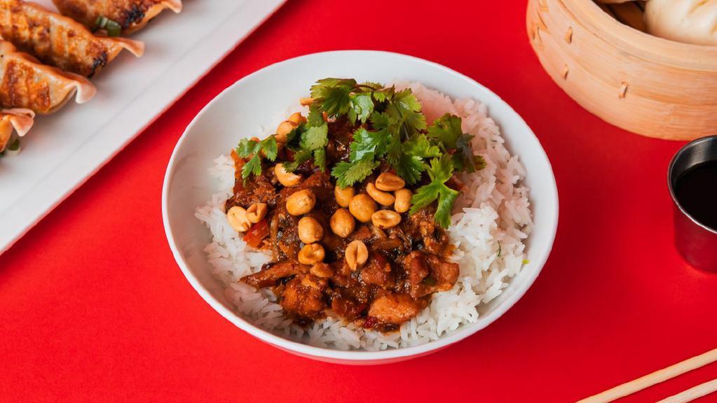 Spicy Kung Pao Chicken Bowl · Tender chicken that is cooked in a sweet and spicy sichuan chili-soy sauce, served on jasmine white rice.