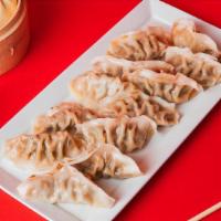 12 Pack Dumplings · Steamed with your choice of Green Vegetable or Ginger Chicken.