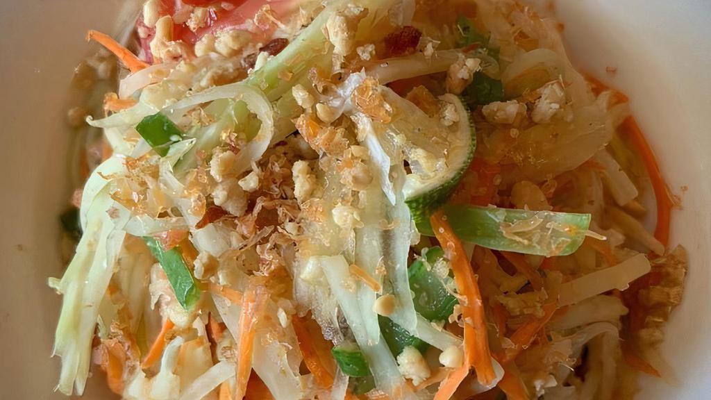 Papaya Salad · A refreshing mixed of fresh papaya mixed with garlic, chili, ground peanut, tomato, carrot, green bean, tossed in lime dressing; served with lettuce.