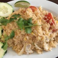 Thai Fried Rice · Fried rice with egg, tomato, onion, green onion and choice of chicken, pork, beef (for an ad...