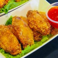 Chicken wings · 6 pieces T4 marinated deep fried chicken wings. You can have