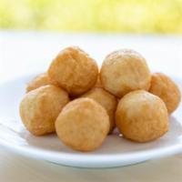 Fish Balls · Fish balls are rounded meat balls made from fish paste which are then deep fried.
