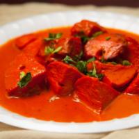 Chicken Tikka Masala · Boneless cubes of chicken marinated and cooked in tandoor simmered in tomato sauce and spice...