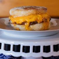 Sausage Breakfast Sandwich  · Pork Sausage Patty, Egg, Cheddar Cheese & House-made Chipotle Aioli on an English Muffin