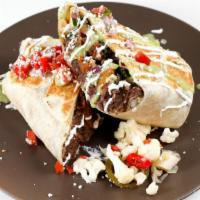 Roasted Veggie Burrito · Butternut squash, borracho beans, cilantro rice, baby lacinato kale, queso fresco, pickled o...