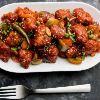 Chilli Chicken · Chicken is marinated with spices, deep fried and cooked on low heat in exceptional sauce.