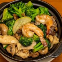 Clay Pot / Cơm Tay Cầm · (Fried rice in hot clay pot topped with stir-fry of broccoli, mushrooms zucchini and combina...