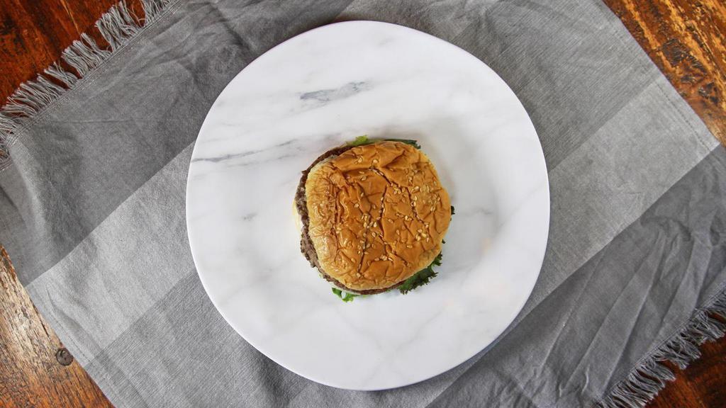 Giant Burger · Thousand Island Dressing, Lettuce, Tomato, Onion, Pickle