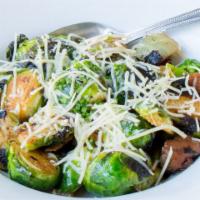 Brussels Sprouts · Bacon, onions, truffle oil, Parmesan Cheese.