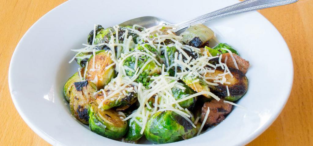 Brussels Sprouts · Bacon, onions, truffle oil, Parmesan Cheese.