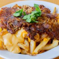 Carnitas Fries · Pulled pork, Cheddar cheese sauce, cilantro and a side of chipotle ranch.