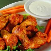 Buffalo Wings · Spicy. Buffalo wings is served with bleu cheese or ranch dipping sauce.