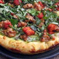 The Tuscany (Large) · Our Tuscany is topped with basil, mozzarella cheese, Italian sausage, pesto sauce, pineapple...