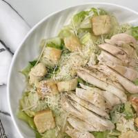 Caesar Salad · Vegetarian. Crisp romaine lettuce, Parmesan cheese, homemade croutons, and Caesar dressing.