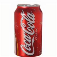 Coke · Choose a 12 oz can or 20 oz bottle.