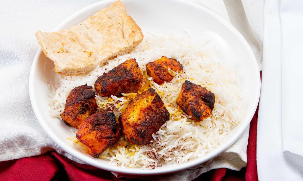 Chicken Kabob · Chunks of boneless chicken breast, marinated in a special seasoning cooked on an open flame.