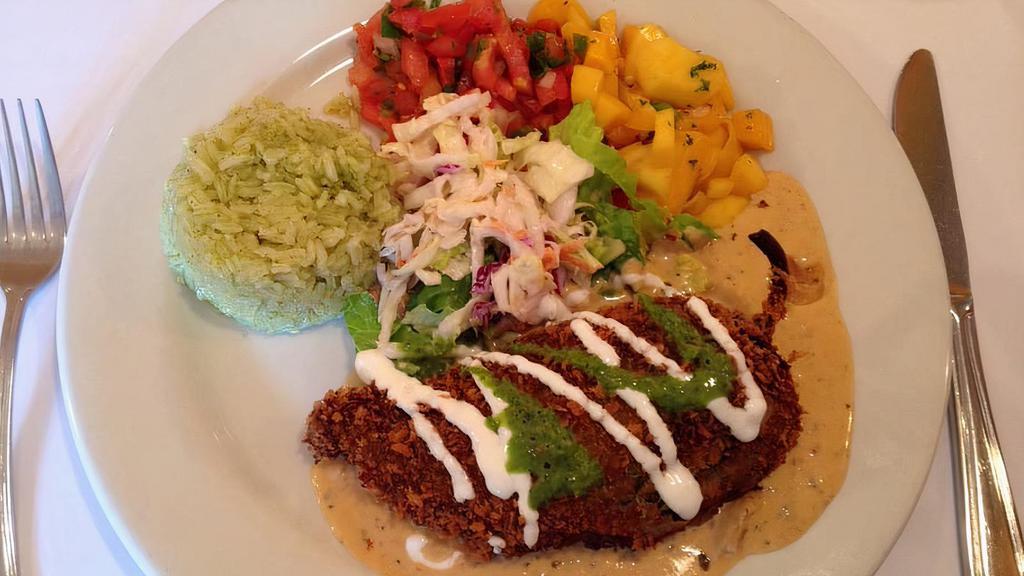 Mole Poblano · Served with grilled chicken breast, salsa fresca, guacamole, poblano sauce, rice and refried beans.